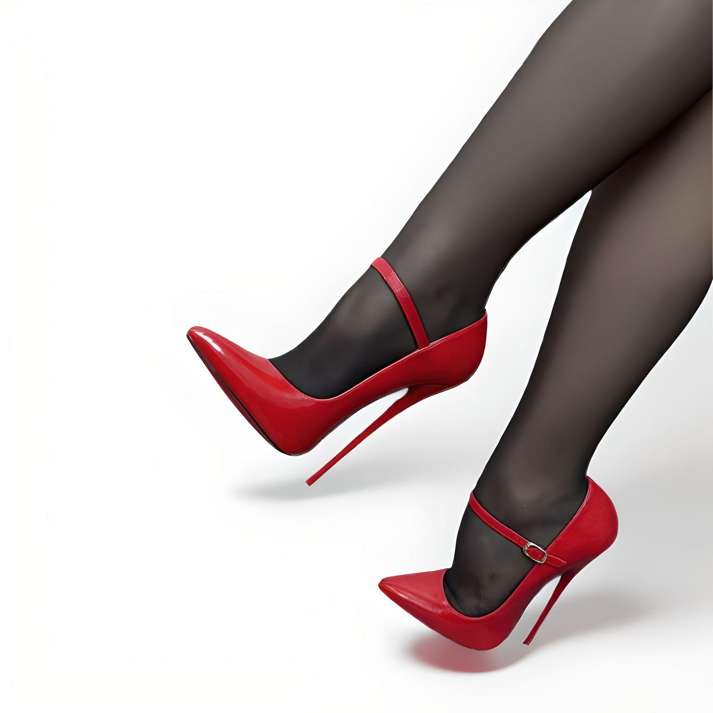 Female model posing in red patent pointed toe Mary Jane pumps with high stiletto heels."