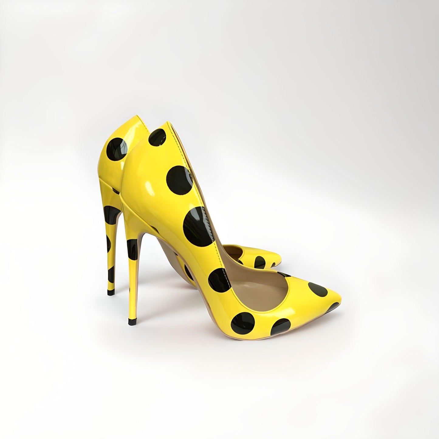 Polka dot patent stiletto pumps