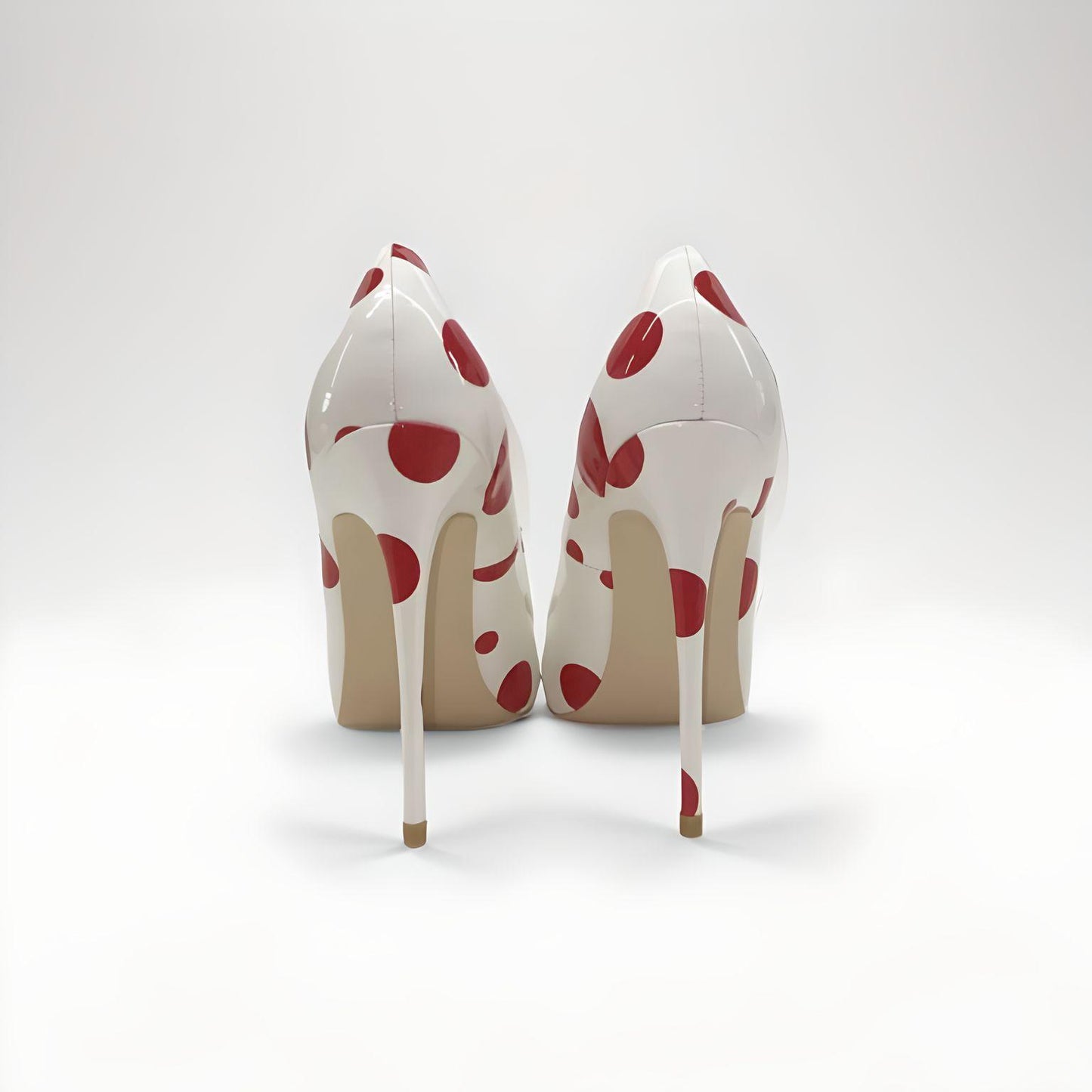 Polka dot patent stiletto pumps