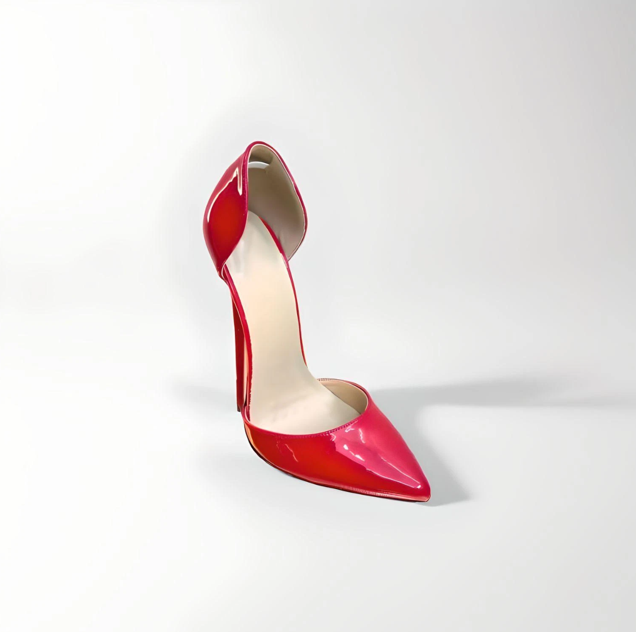 Red 16cm stiletto D’Orsay pointed toe patent pumps front view
