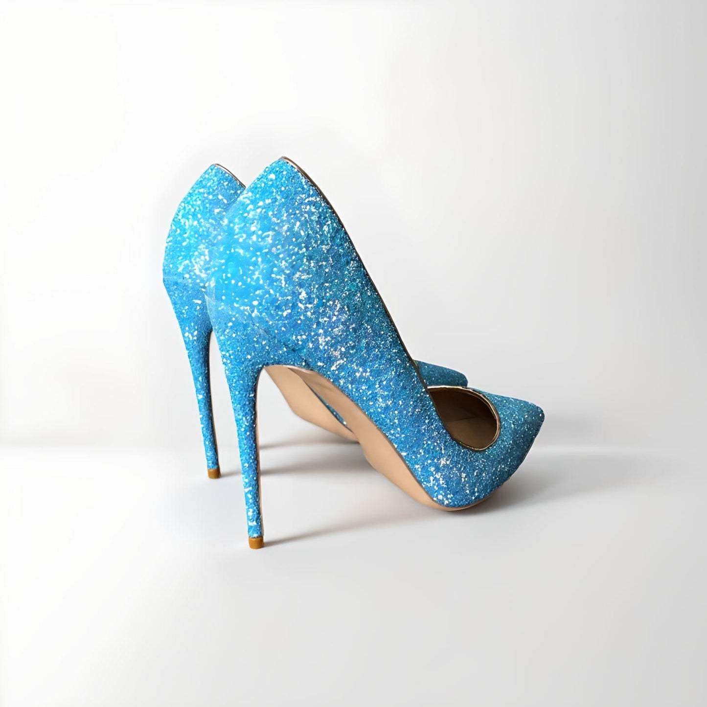 Blue glitter stiletto pumps