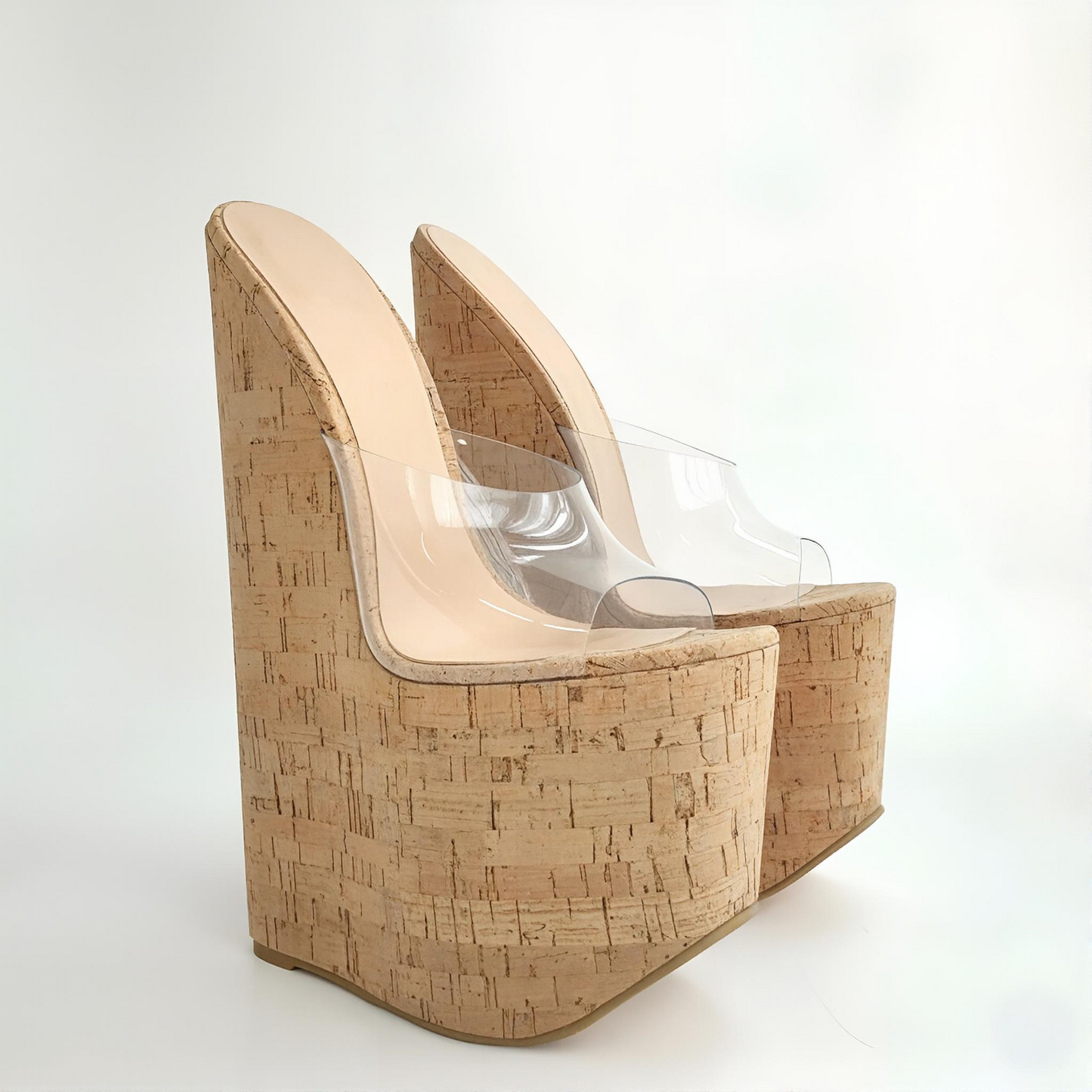 Extreme high heel cork wedge mules with clear peep toe upper