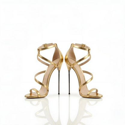 Pair of gold 16cm stiletto high-heeled sandals on a white background