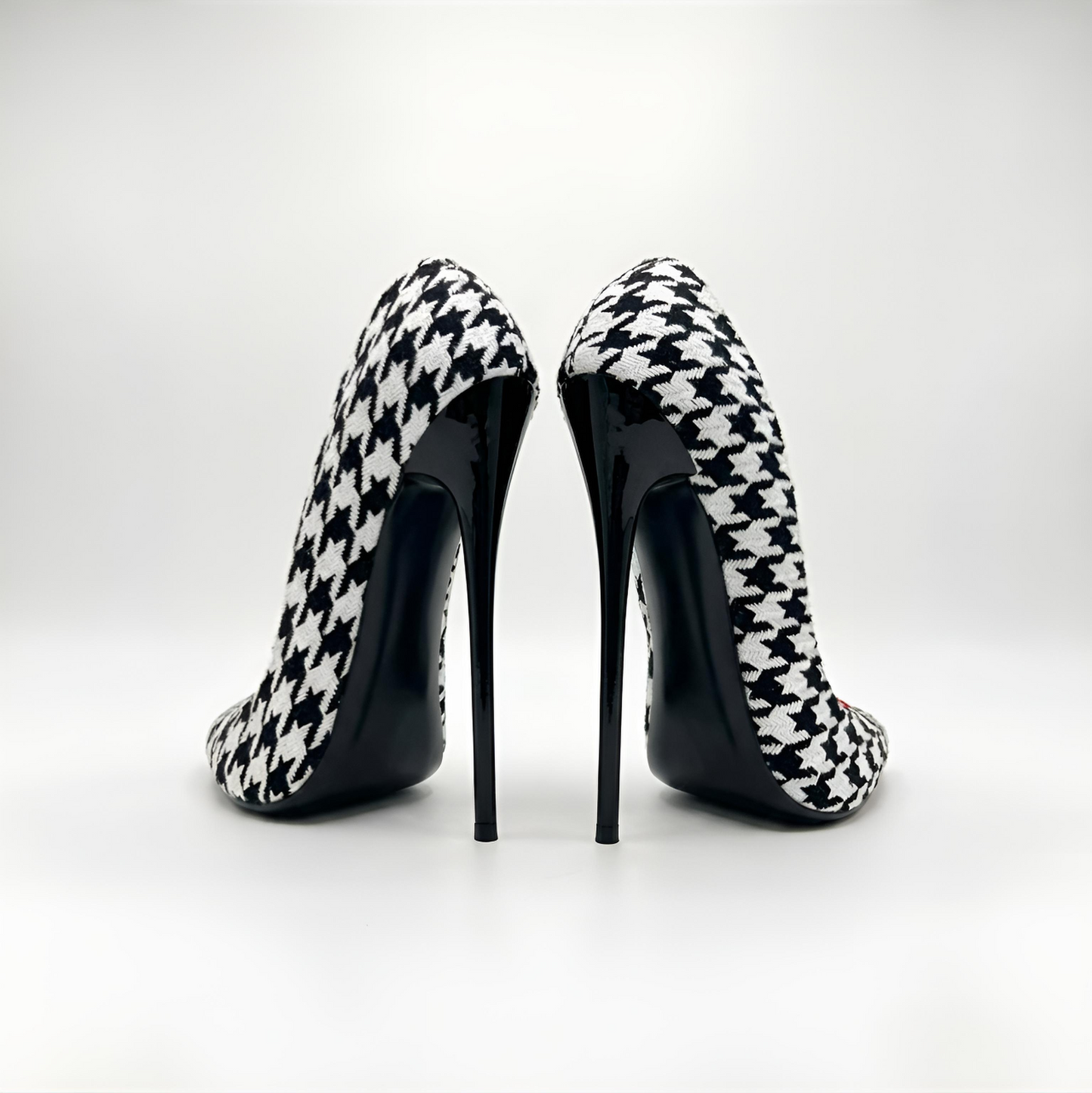 Houndstooth pointed high heel stiletto pumps