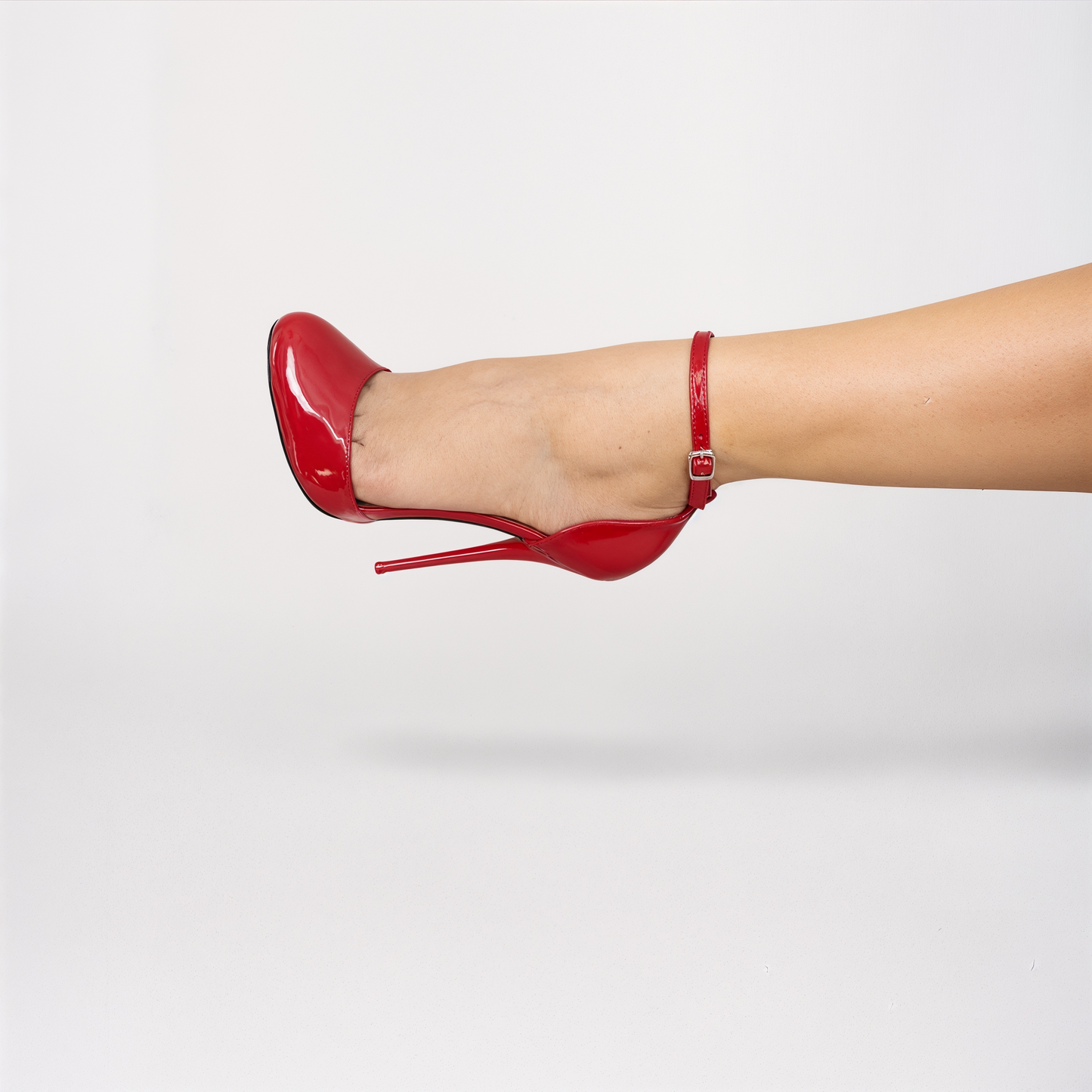D'Orsay round toe ankle strap stiletto pumps
